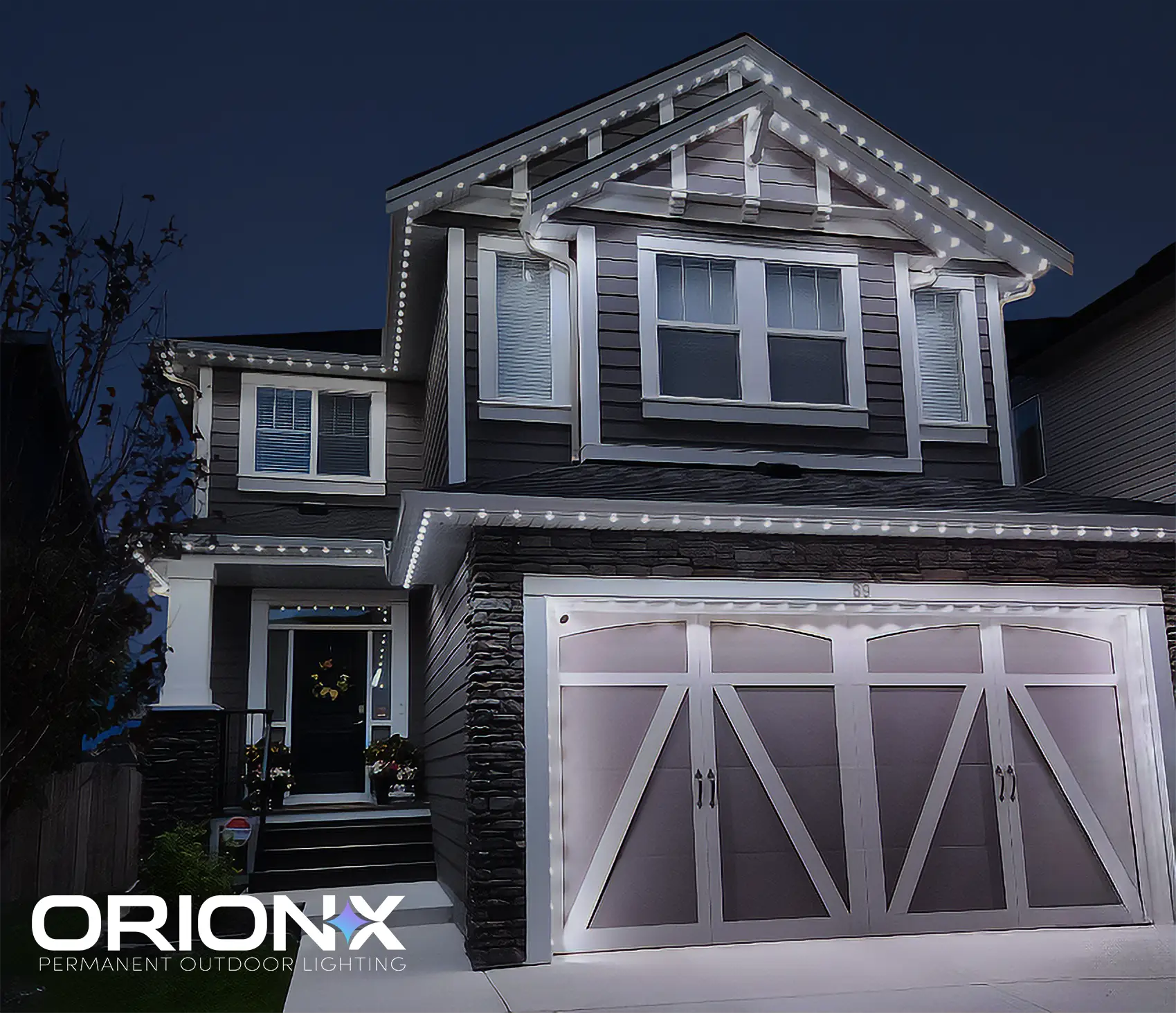 Home with permanent roofline lighting in classic warm white